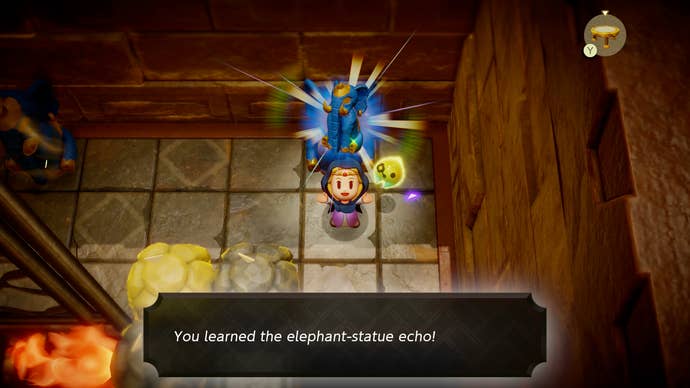 Princess Zelda holding up an elephant statue echo in Zelda: Echoes of Wisdom.