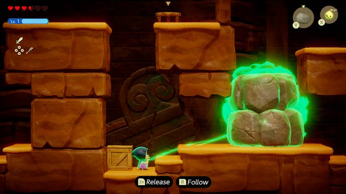 Princess Zelda uses Tri to move a giant boulder in Zelda: Echoes of Wisdom.