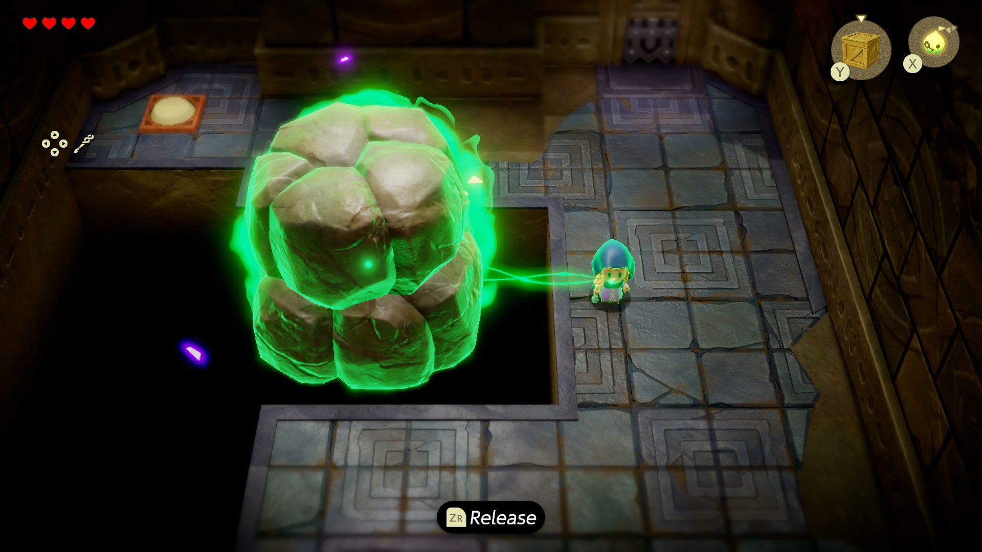 Princess Zelda pulling a giant boulder in Suthorn Ruins in Zelda: Echoes of Wisdom. - 8