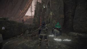 The player stands in front of Primeval Sorcerer Azur in Mt. Gelmir in Elden Ring