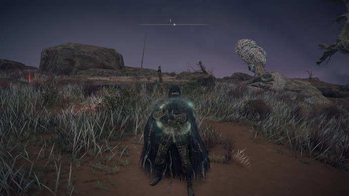 The player stands in south Caelid wielding the Death’s Poker weapon in Elden Ring