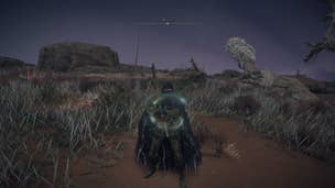 The player stands in south Caelid wielding the Death's Poker weapon in Elden Ring