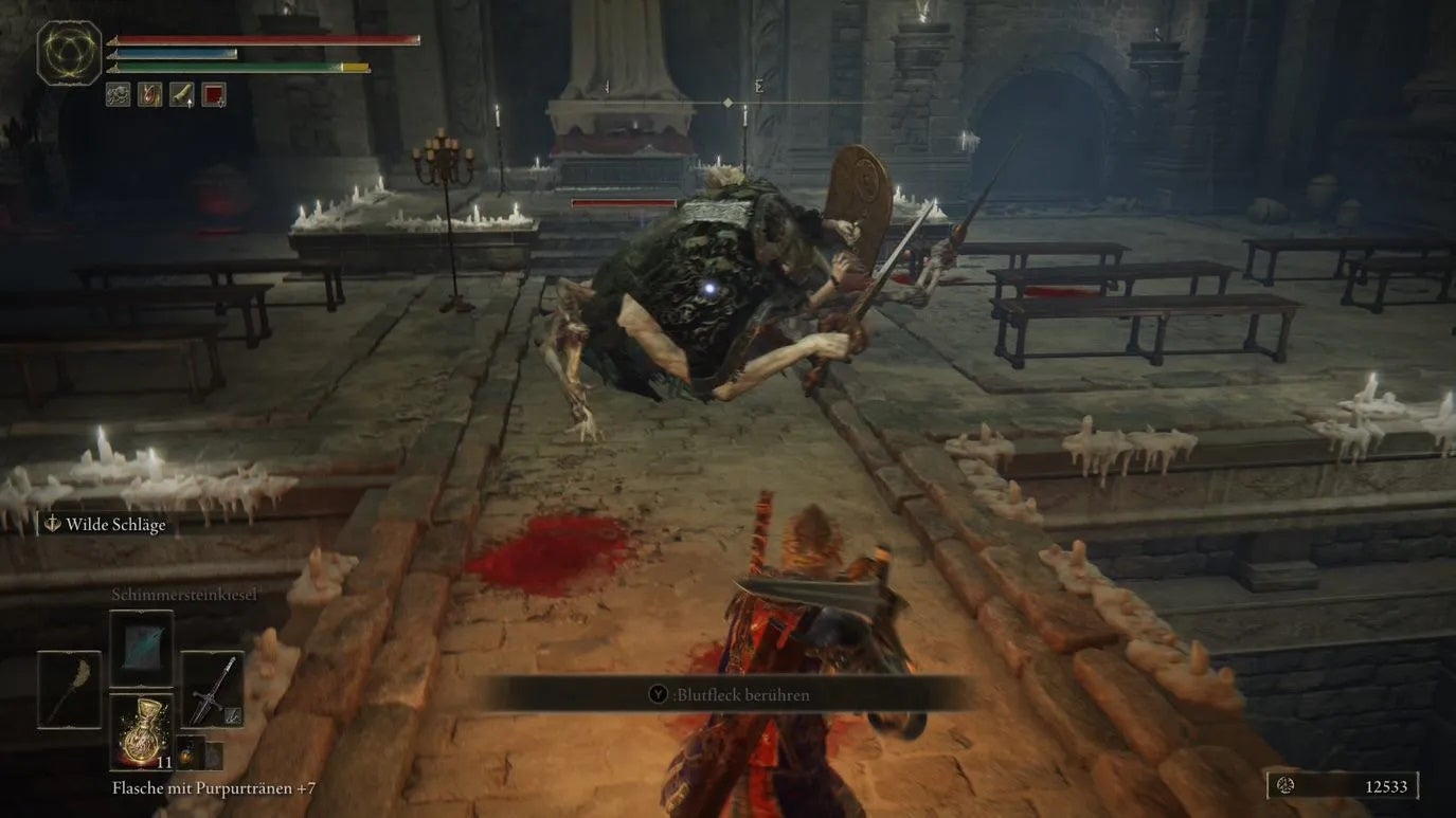 Armoured Elden Ring main character fighting a Grafted Scion enemy.