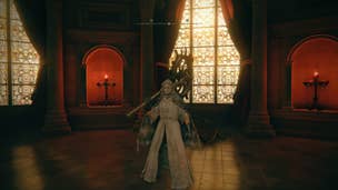 The player stands at the front of the dining hall in Elden Ring's Volcano Manor, while wielding the Ghiza Wheel