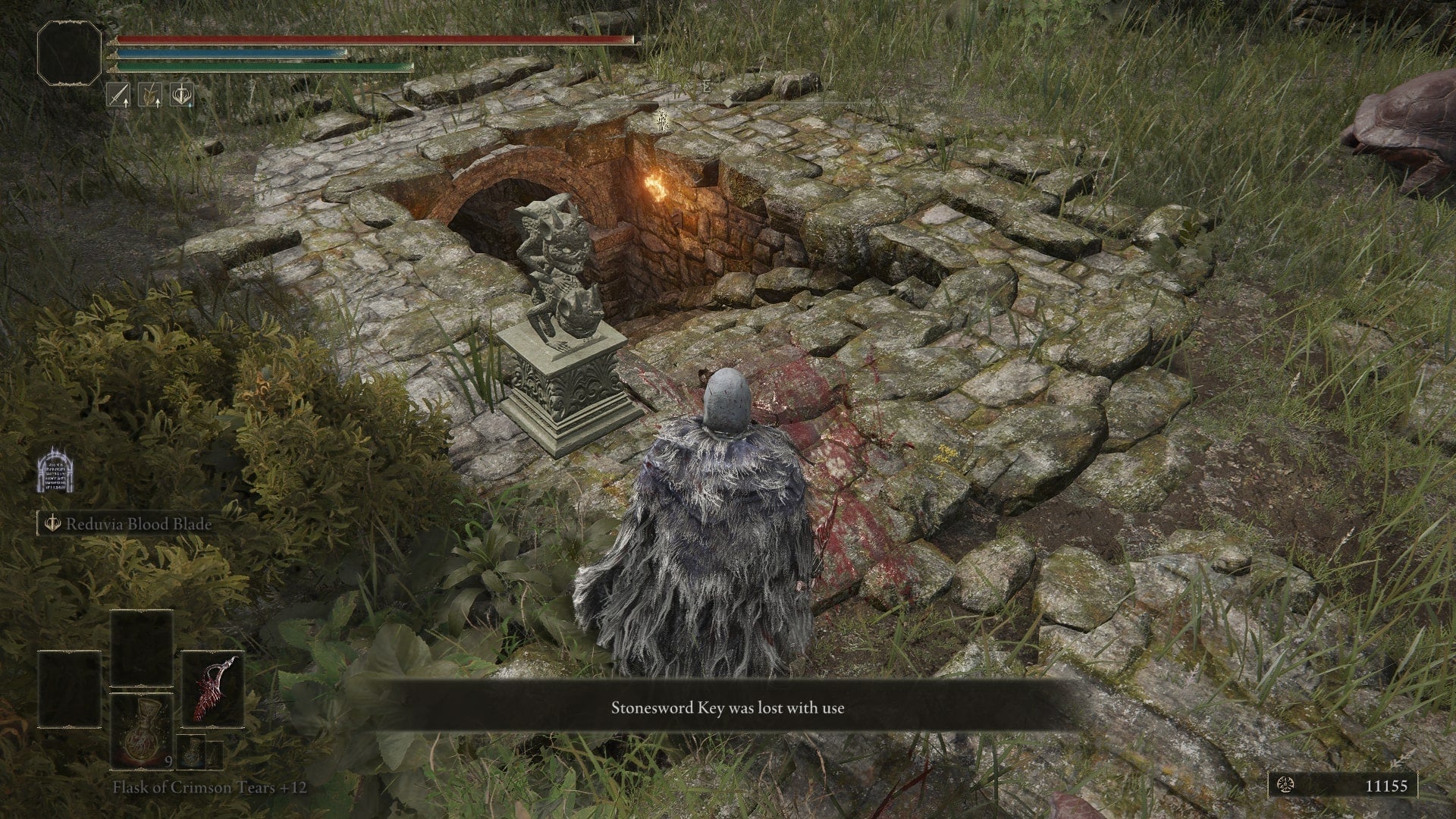 The player faces an underground area beneath Summonwater Village that requires a Stonesword Key to unlock in Elden Ring - 4