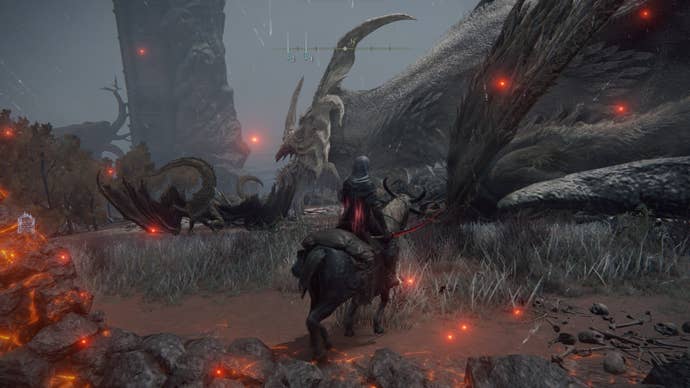 The player looks at Elder Dragon Greyoll and their children who surround them in Elden Ring