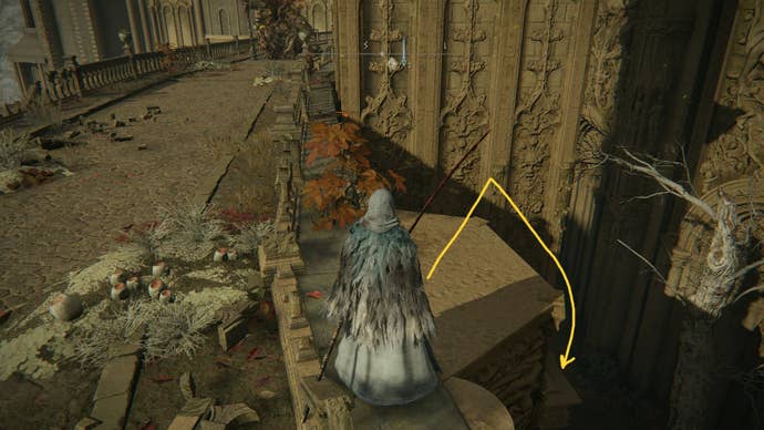 The player stands on a bridge in Miquella's Haligtree, with an arrow pointing out the route to Marika's Soreseal in Elden Ring