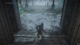 The player uses the Hoarfrost Stomp Ash of War at the main gate of Caria Manor in Elden Ring