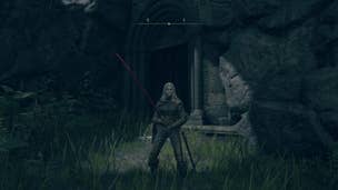 The player stands outside of the entrance to Tombsward Catacombs in Elden Ring