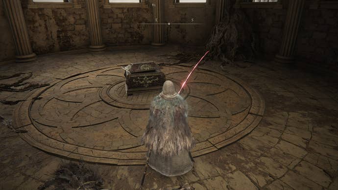 The player faces the chest containing the Old Lord's Talisman in Crumbling Farum Azula in Elden Ring