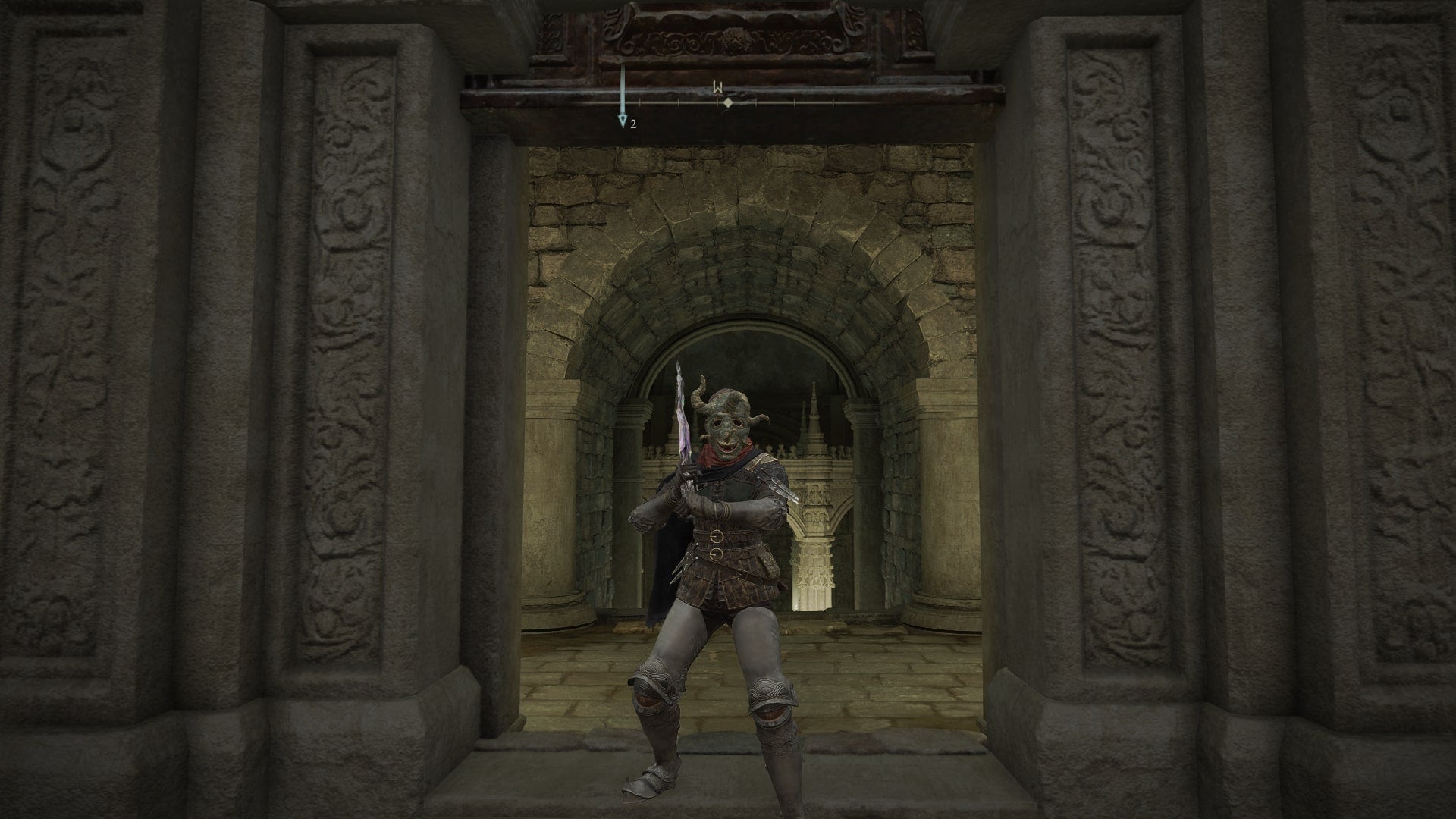 The player stands outside of Sainted Hero&rsquo;s Grave in Elden Ring