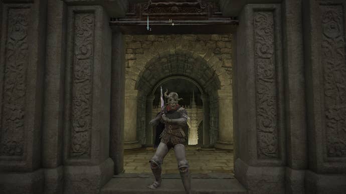 The player stands outside of Sainted Hero’s Grave in Elden Ring