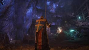 An armoured main character with a large shield on their back standing in the Sellia Crystal Tunnel in Elden Ring.