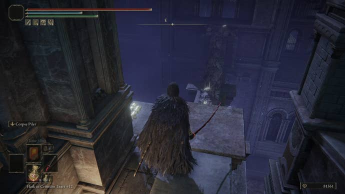 The player looks at a ruined bridge in front of them, which can be walked across to access another building containing the Mimic Tear Spirit Ashes in Elden Ring
