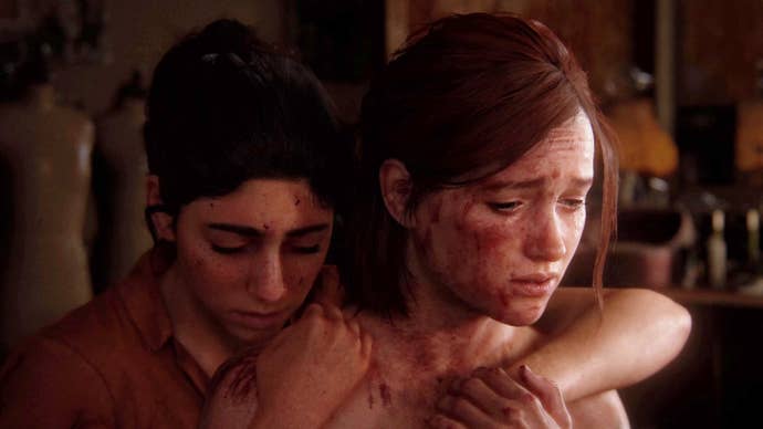 Dina hugs a weary Ellie from behind in The Last of Us Part 2