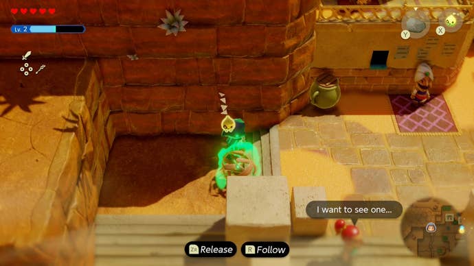 Zelda dragging a tumbleweed up a small set of stairs in Zelda Echoes of Wisdom.