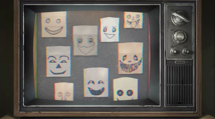 Replicas of the paper bag worn by Emio shown on a television screen.