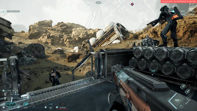 Screenshot of Eve Vangaurd, the player is equipped with a small rifle, other players are scaling a set of industrial barrels