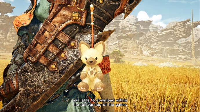 Bonus beta pendant hanging from a sword in Monster Hunter Wilds.