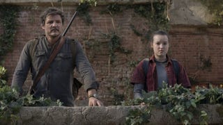 Pedro Pascal and Bella Ramsey looking towards the camera on a dilapidated building in the last of us season 1 HBO show