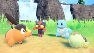 Pokémon Scarlet and Violet Hidden Treasure of Area Zero DLC picture showing Tepig, Litten, Squirtle and Turtwig in-game