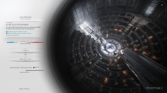 Inside the Council building in Frostpunk 2. It's a circular chamber that looks a lot like a Parliament - there are rows of pews where people sit to discuss the laws of their society.