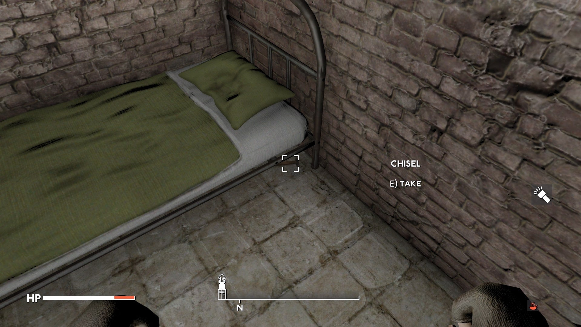 The player looks at a chisel beneath the bed in their prison cell in Fallout 4 mod, Fallout London - 4