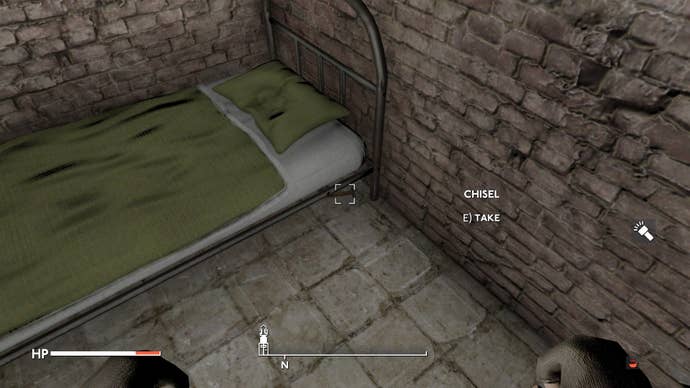 The player looks at a chisel beneath the bed in their prison cell in Fallout 4 mod, Fallout London