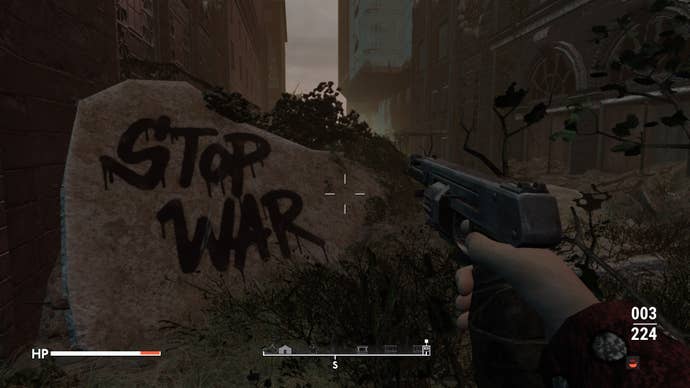 The player aims their weapon at a stone spray-painted with ‘stop war’ in Fallout 4 mod, Fallout London