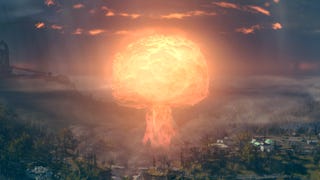 An atomic explosion creates a fiery mushroom cloud, seen in Fallout 76.