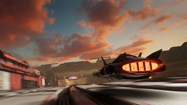 A hovering vehicle speeds towards the end flags of a futurisitic race track.