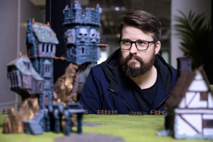 Darktide preview - Fatshark’s Mats Andersson surveys a tabletop layout of Warhammer buildings and objects