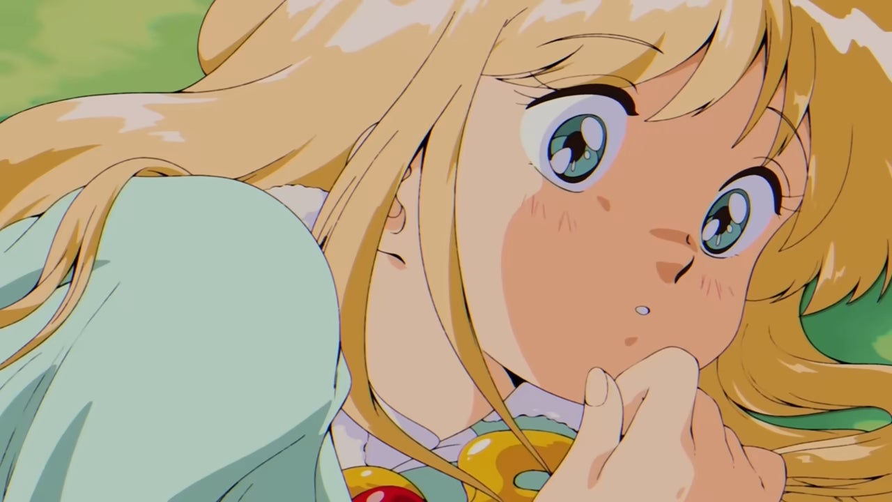Fields of Mistria trailer screenshot showing a blond woman in close up, drawn in anime style, having just woken up in a field looking shocked