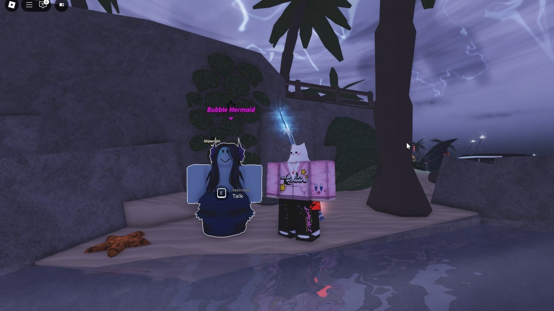 The player stands beside the Bubble Mermaid at Grand Reef in Fisch - 1