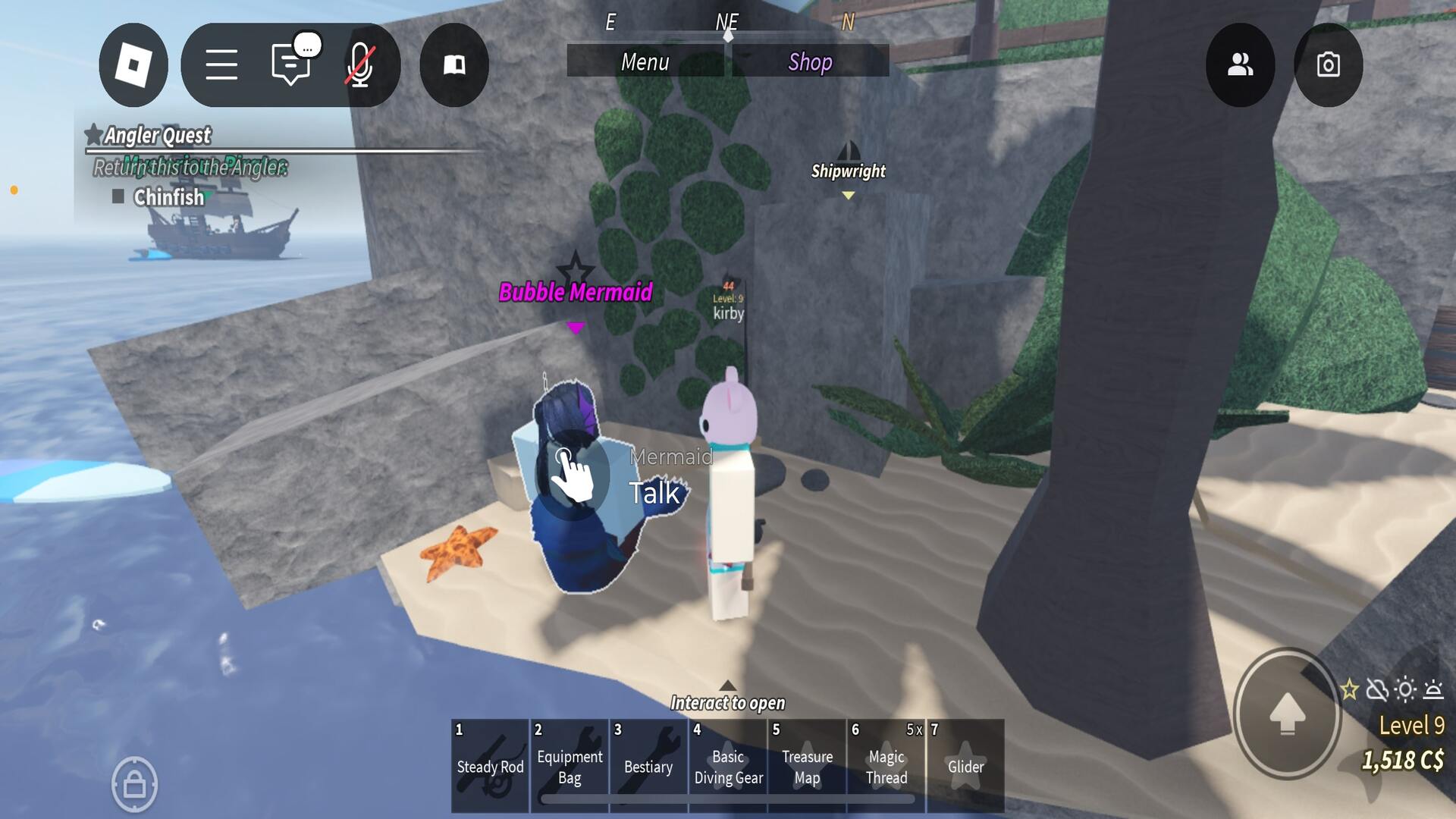 The player stands beside the Bubble Mermaid at Grand Reef in Fisch - 3