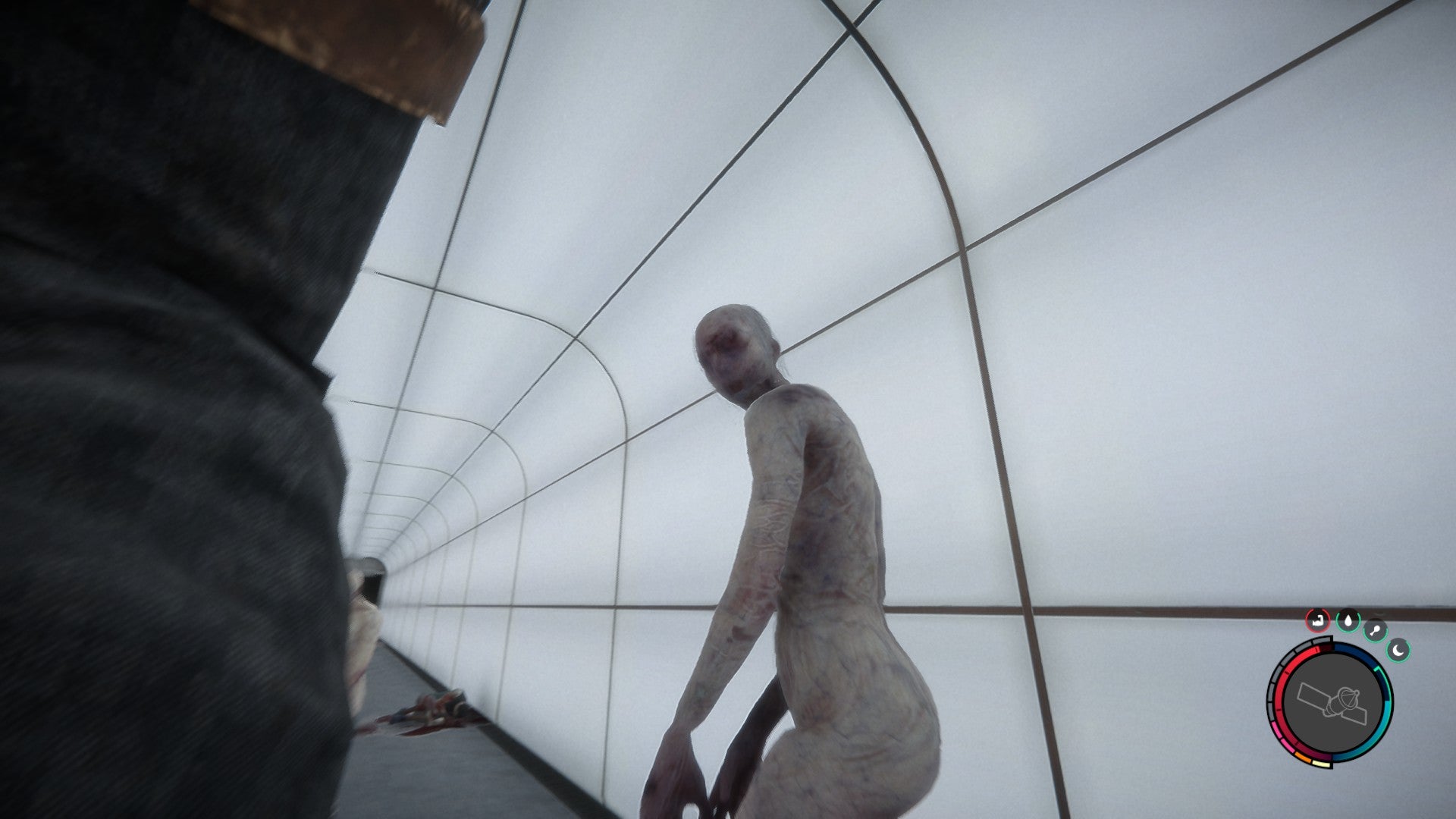 A naked monster with new eyes or mouth turns to face the player in a tunnel in Sons Of The Forest - 7