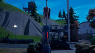 Fortnite emergency beacon locations and where to activate an emergency beacon at Titled Towers and Coney Crossroads