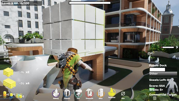 Fortnite Re:Imagine London screenshot showing a large cube being positioned next to modern buildings