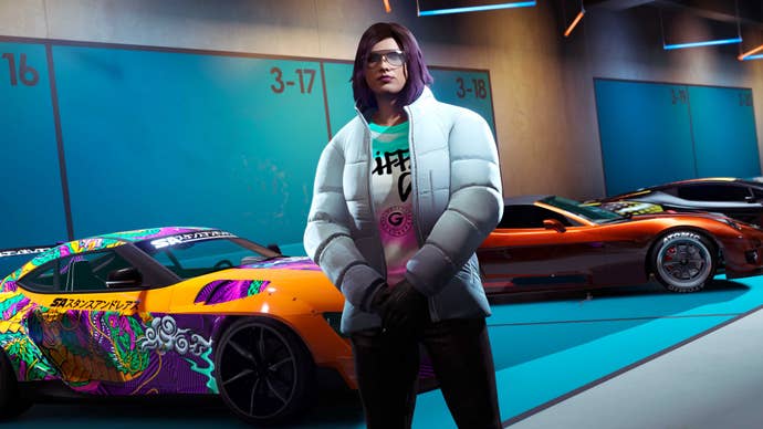 A woman in a puffy jacket and rad specs with purple hair standing in front of some also-rad, colourful cars.