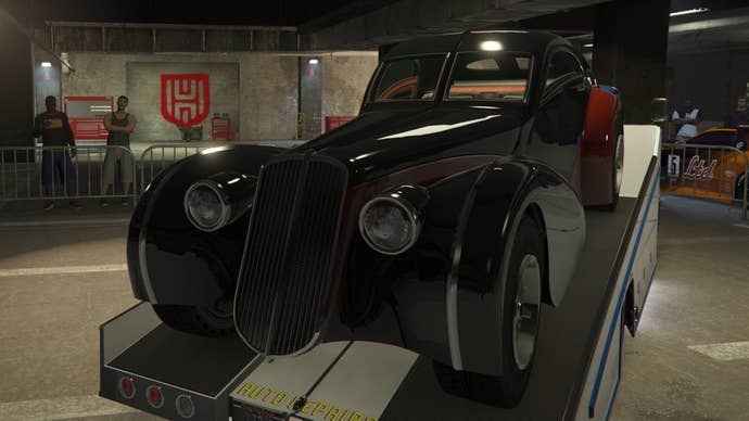 GTA Online, a Truffade Z Type is on the back of the Slam Truck in the middle of the LS Car Meet.