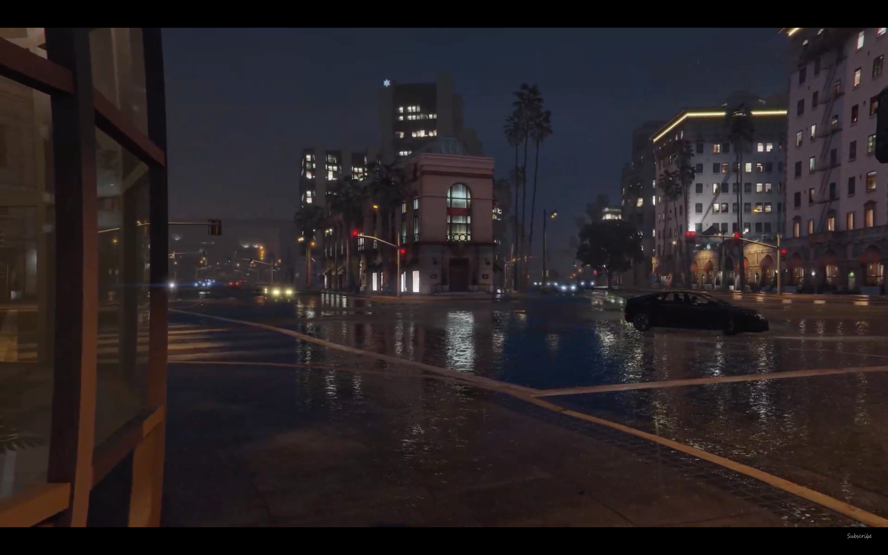 A rainy street and traffic intersection in Grand Theft Auto 5