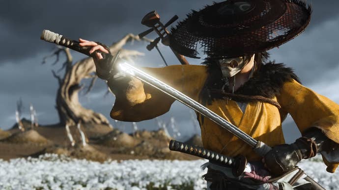 Ghost of Yōtei trailer screenshot showing samurai in yellow garb and wide hat holding a katana shimmering in sunlight