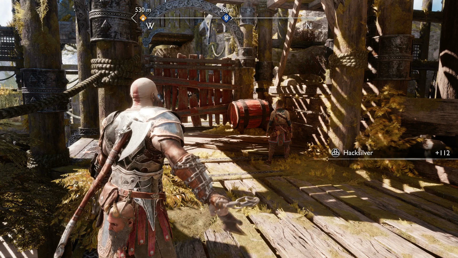 Kratos exploding a red barrel to create a path on Althjof's Rig in God of War Ragnarok - 18