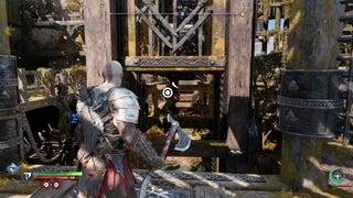 Kratos pulling a lift with his Blades of Chaos on Althjof's Mining Rig in God of War Ragnarok