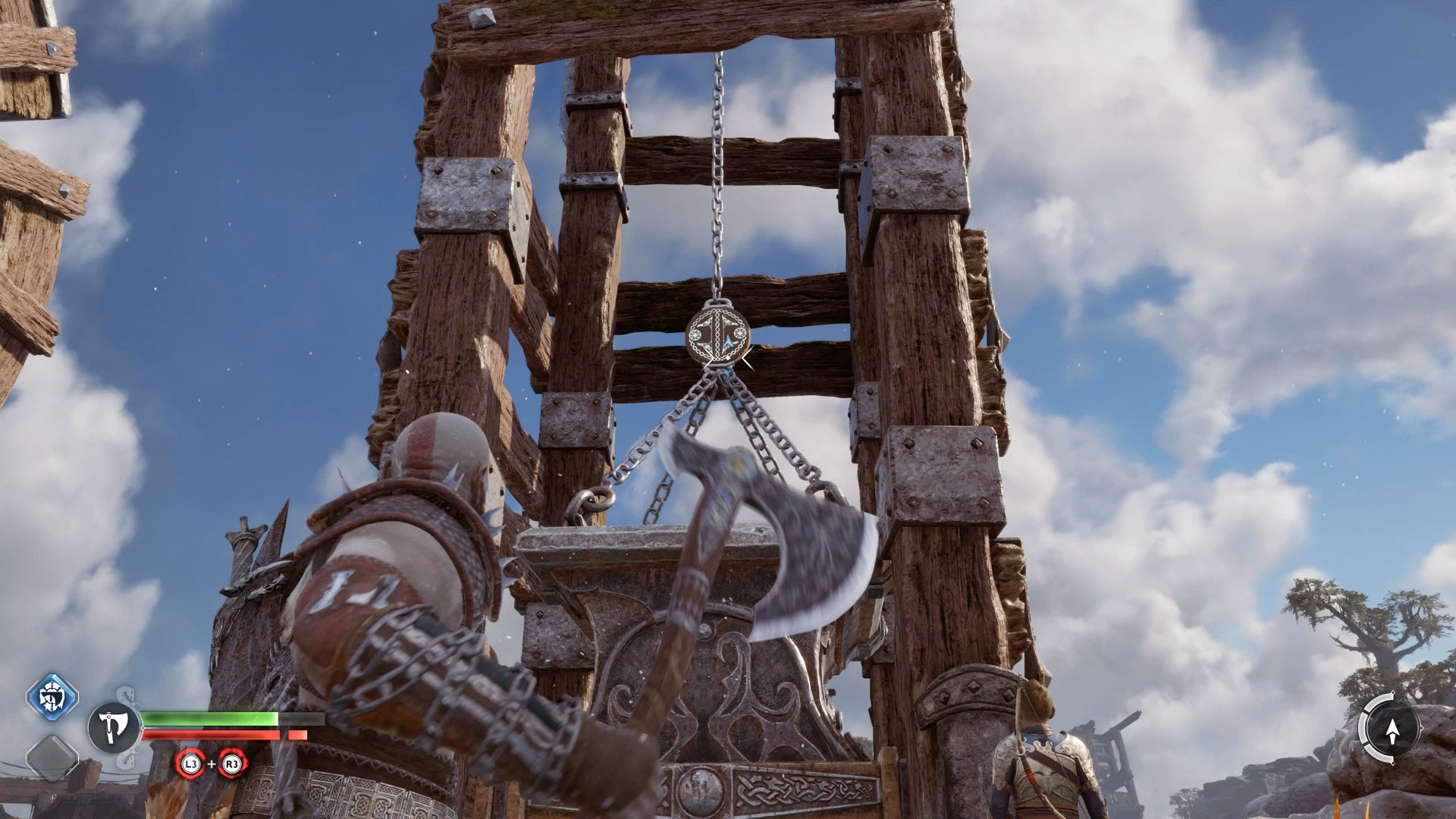 Kratos lining up an axe shot to lower a large weight in God of War Ragnarok - 18