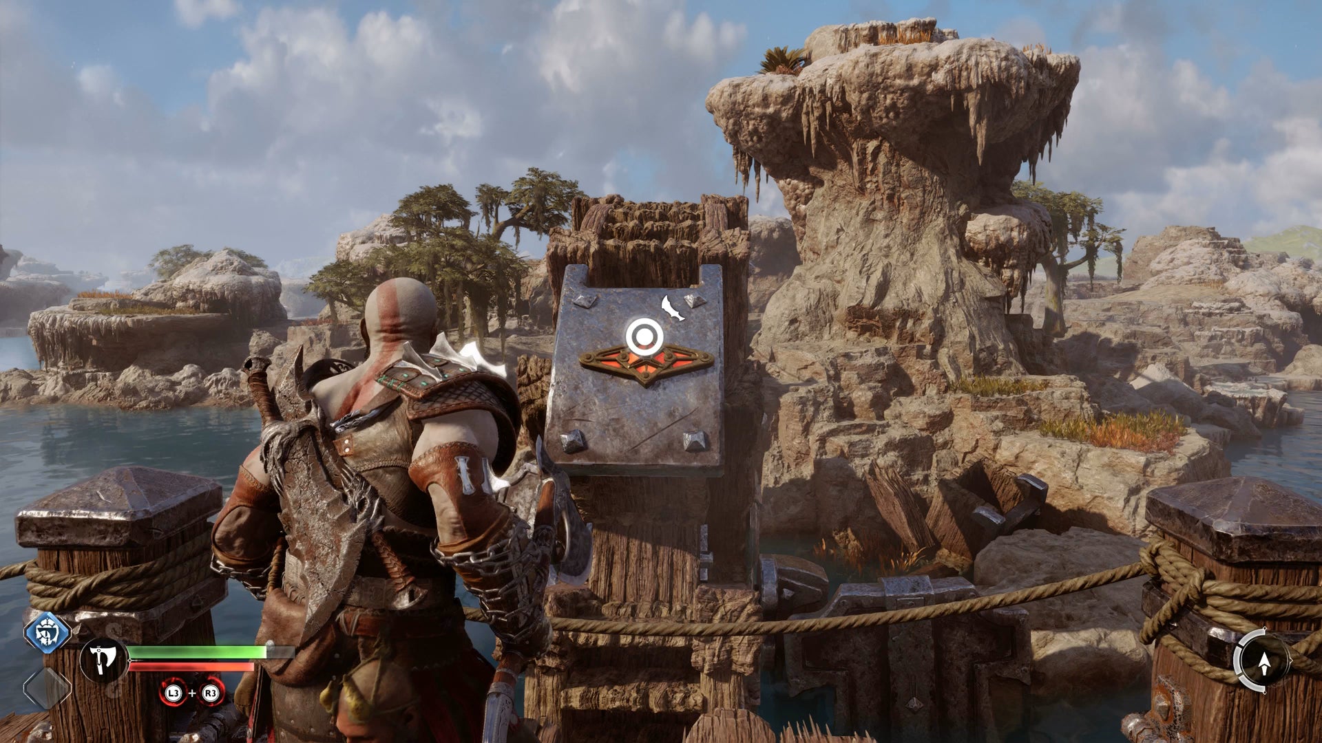 Kratos spinning a water wheel in the Aurvangar Wetlands in God of War Ragnarok - 9