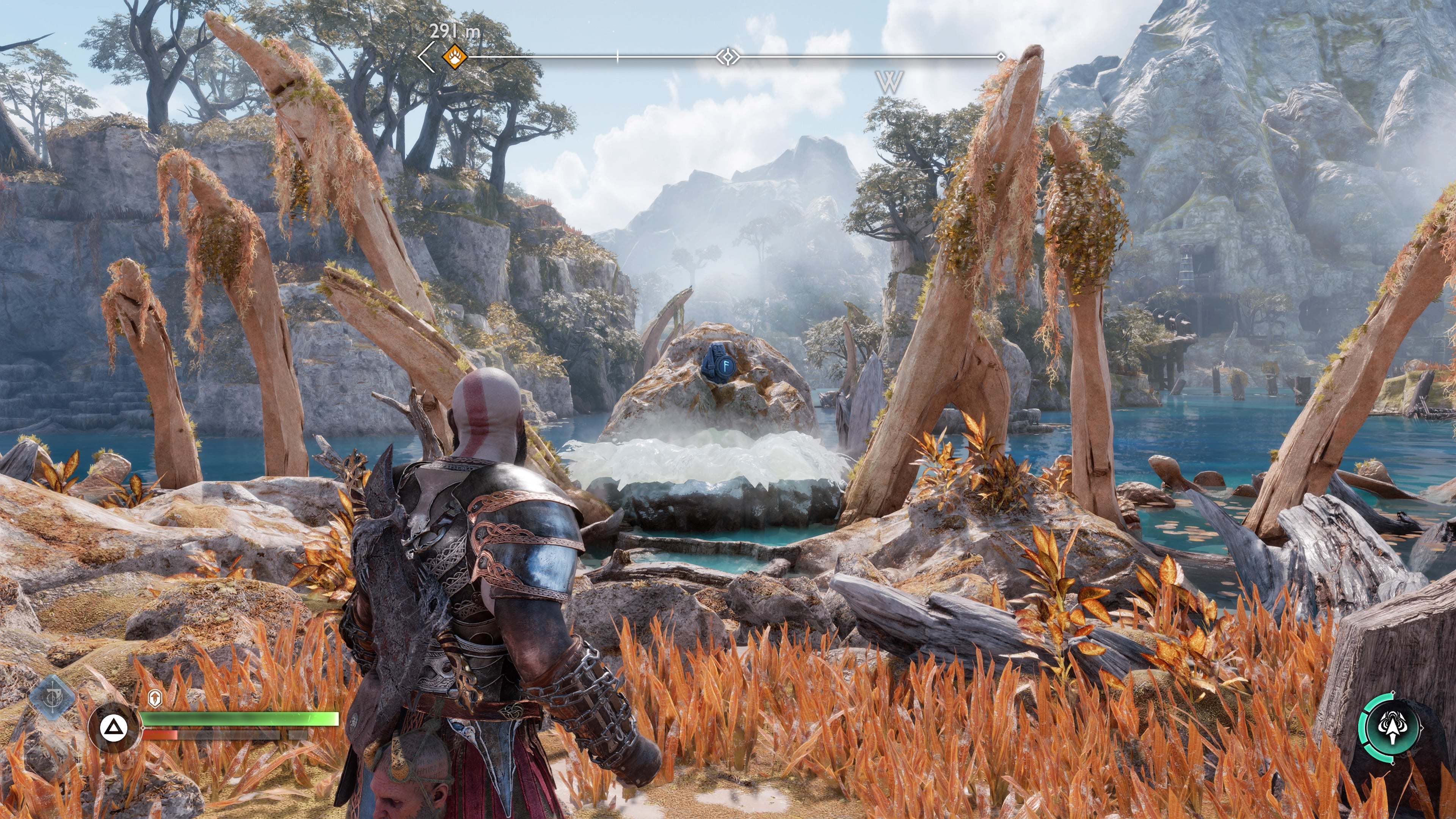 The third idol statue behind a frozen geyser on Dragon Beach in God of War Ragnarok