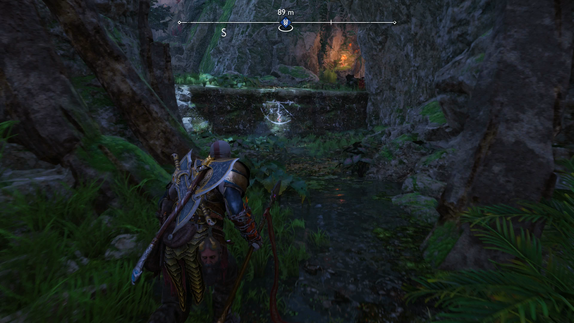 Kratos climbing a low ledge in God of War Ragnarok