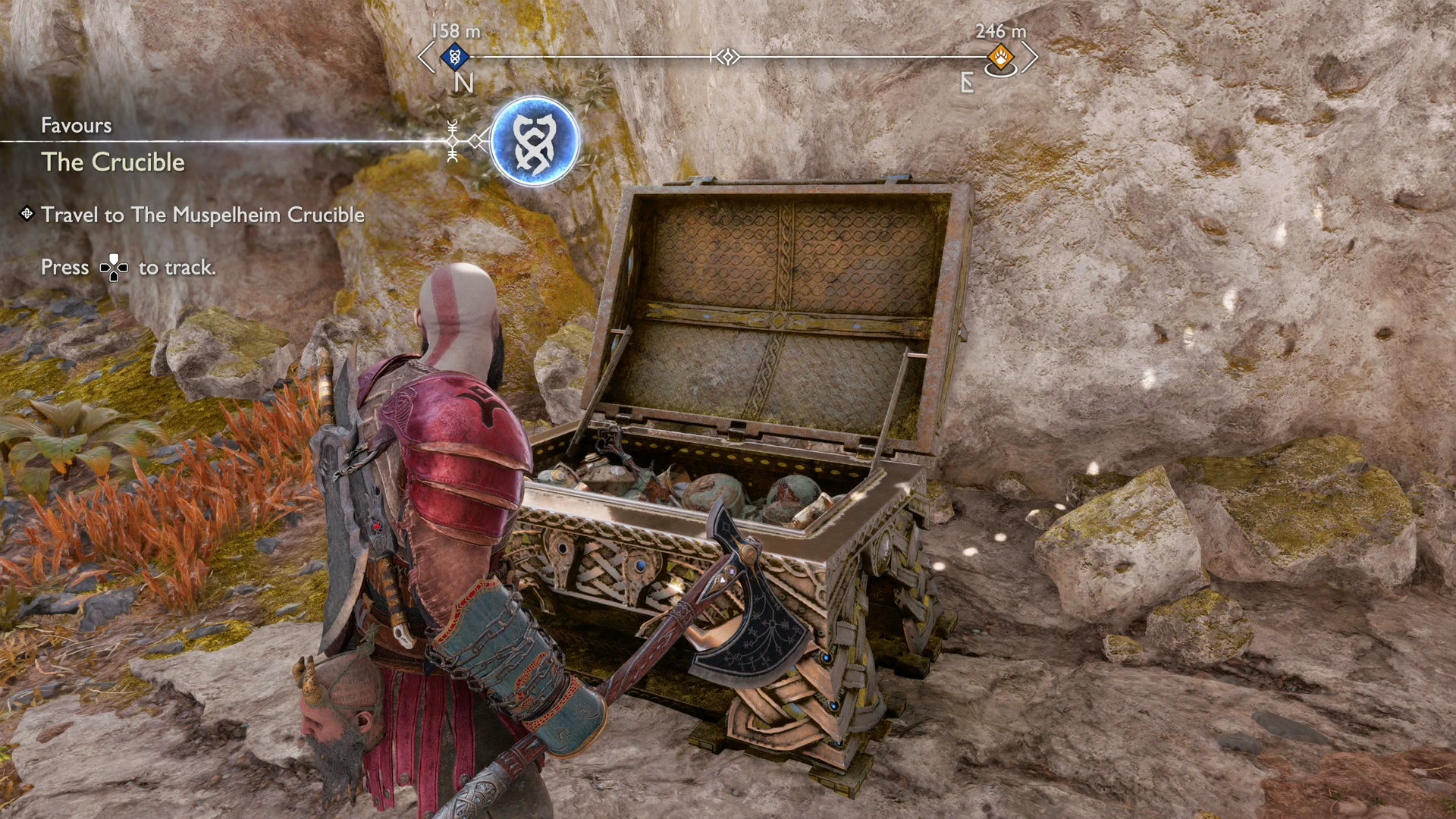 Kratos standing in front of the chest containing the second Muspelheim Seed in God of War Ragnarok