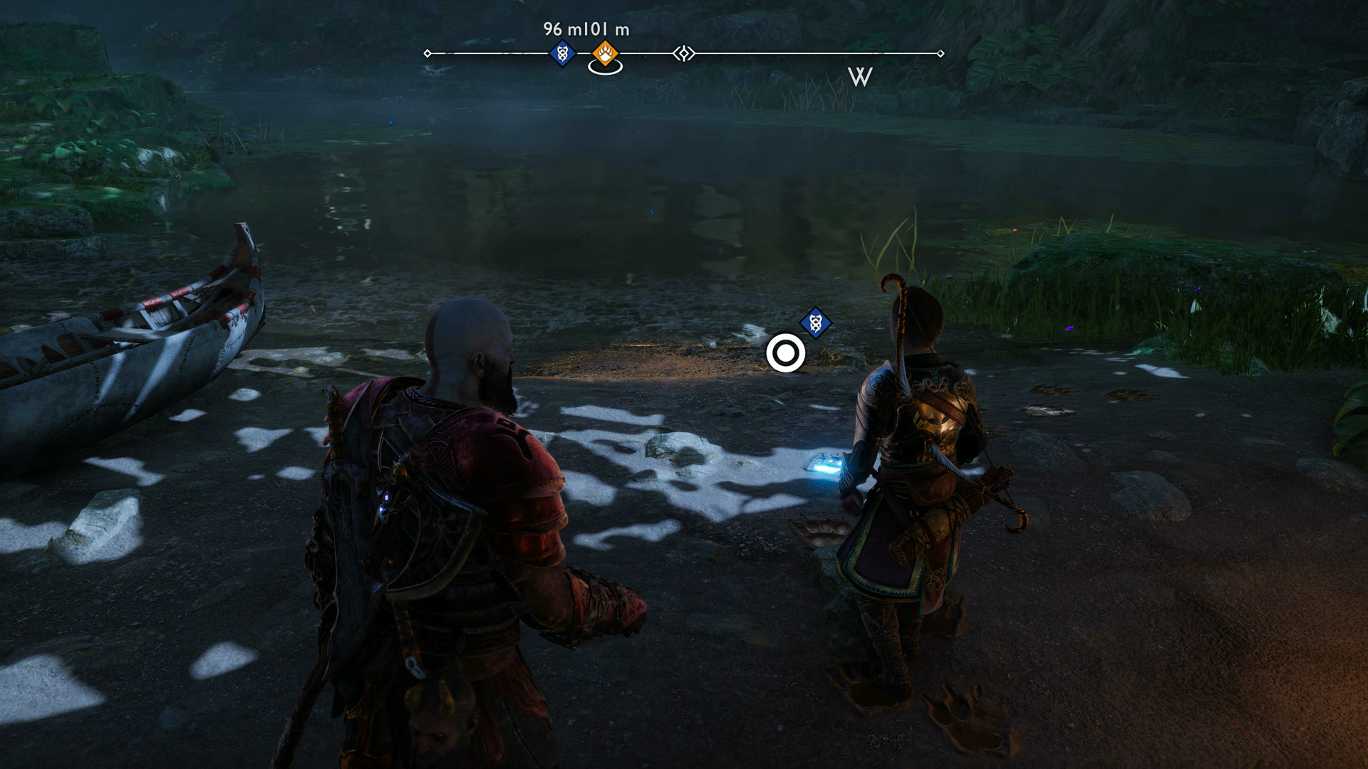 Kratos and Atreus examining some tracks in God of War Ragnarok